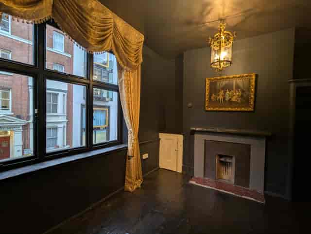Moody breakout room at 41 Whitfield Street for private dining or upscale strategy sessions.
