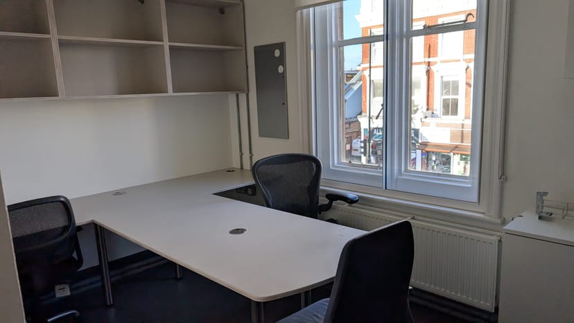 Modern meeting space in Bush Theatre with large table, ideal for workshops and meetings.