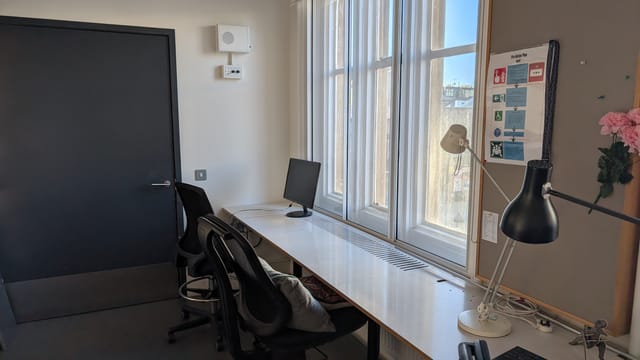 Modern minimalist office space at Bush Theatre, perfect for meetings and brainstorming.