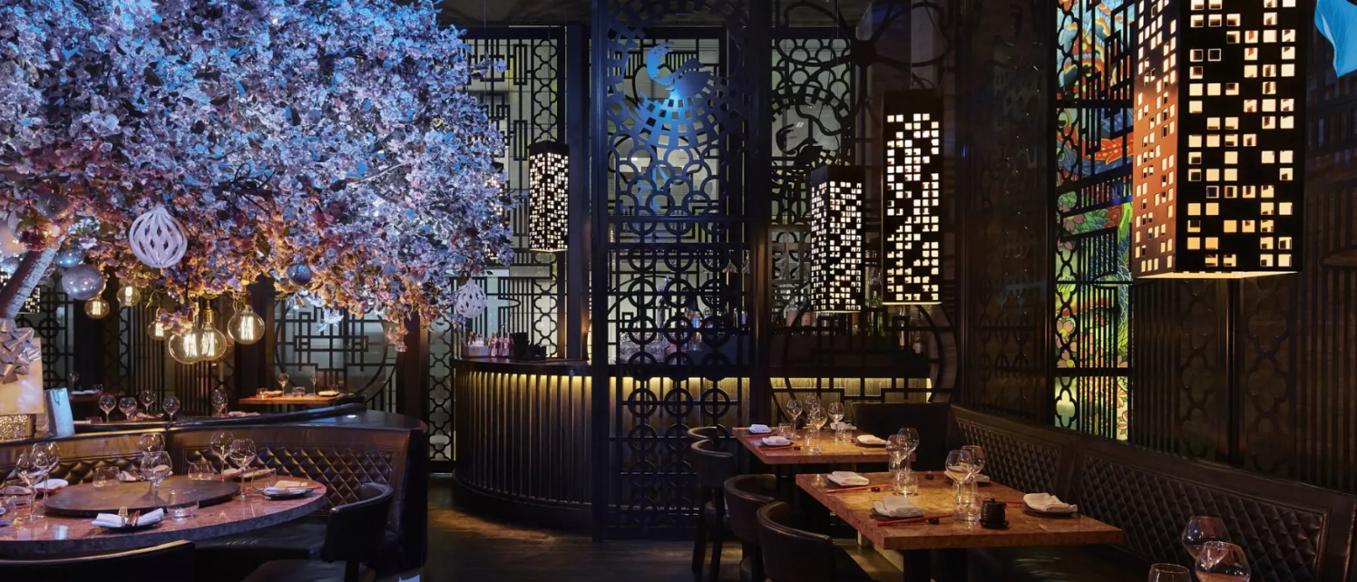 Sophisticated Tattu dining space for luxury corporate dinners and exclusive VIP events.