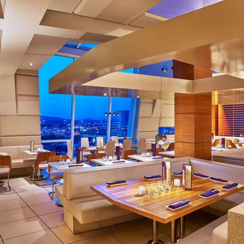 Modern restaurant venue with city views, ideal for corporate events and gatherings.