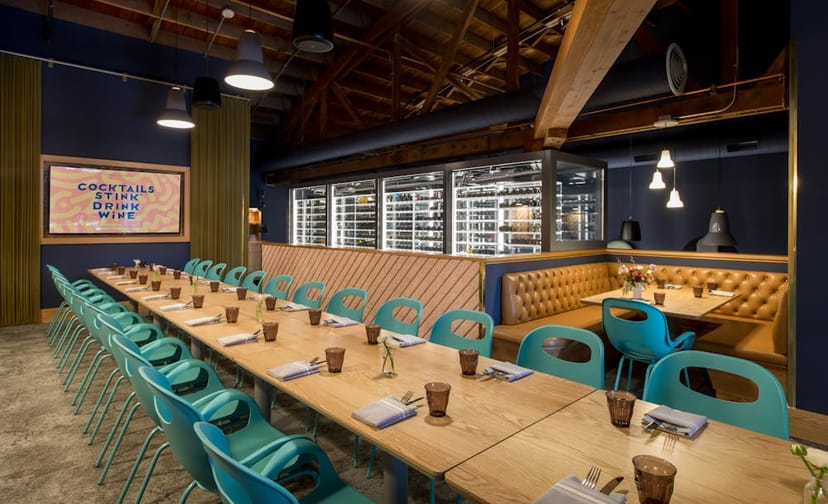 Stylish event space in Enoteca Nostrana with elegant settings for gatherings and meetings.