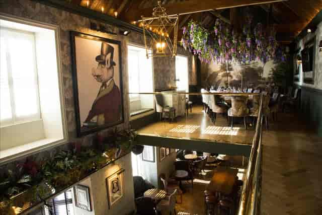 Private dining room at The Impeccable Pig, upscale venue for corporate events and social gatherings.