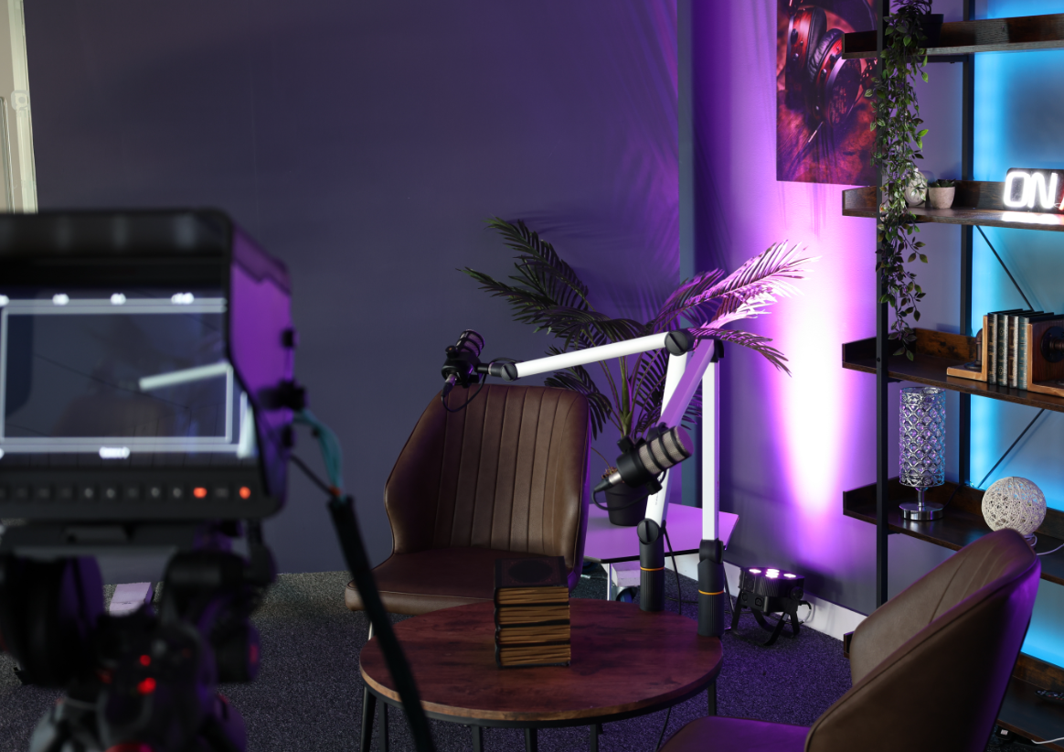 Modern podcast studio setup with stylish decor, ideal for virtual interviews and meetings.