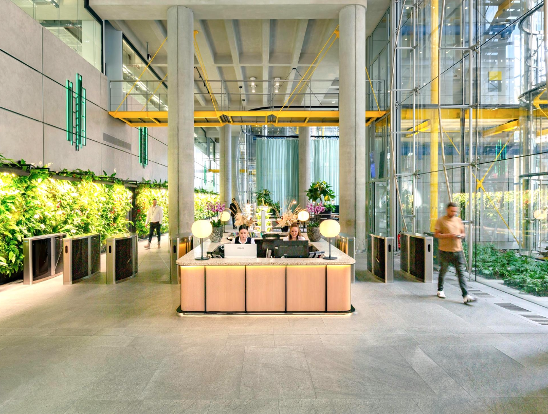 Modern reception area with lush greenery for corporate events at Together 88 Wood Street. - Banner