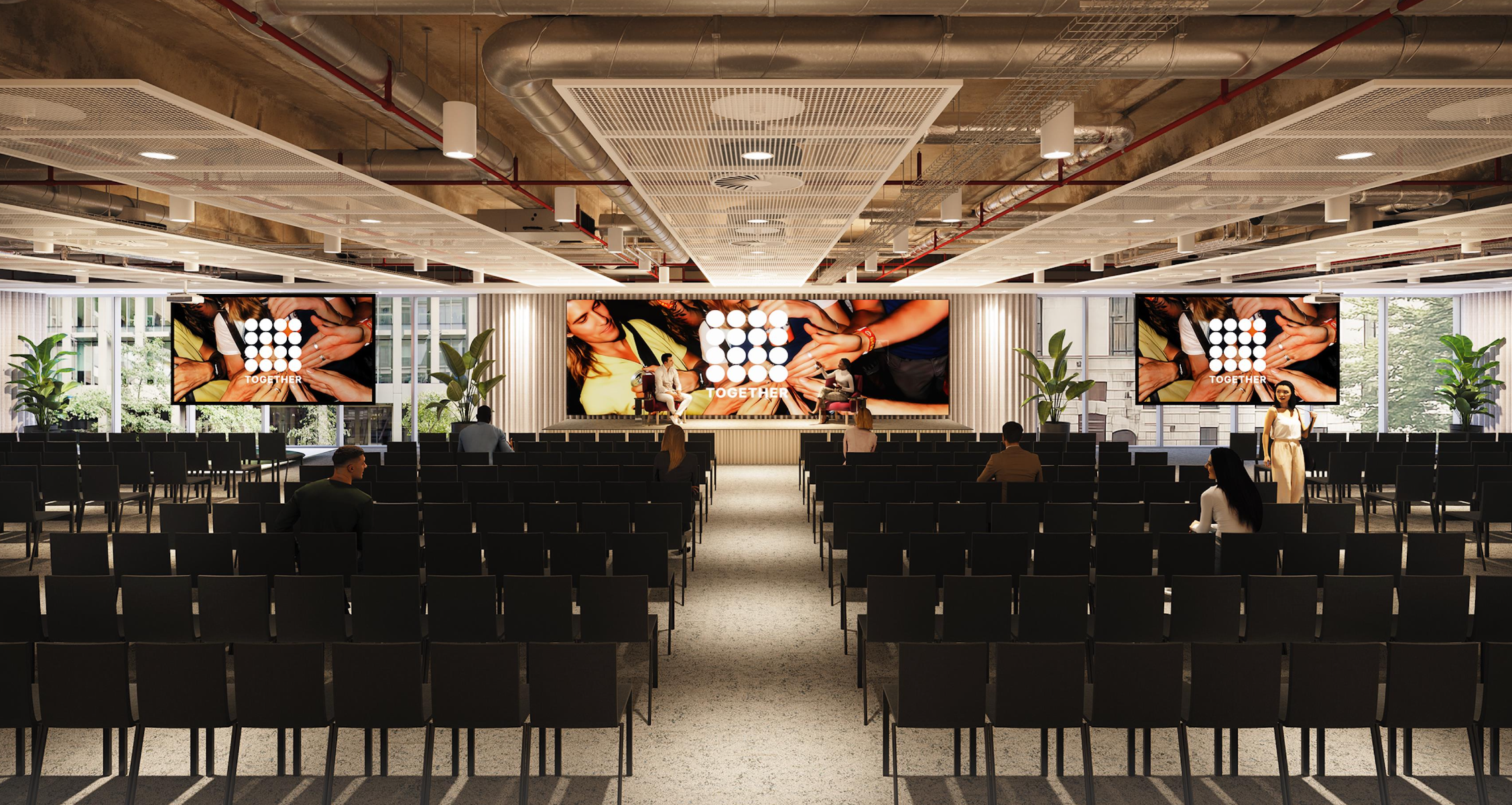 Auditorium Room at Together 88: modern conference space with seating and large screen. - Banner