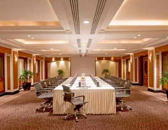Meeting room at Taj Lands End Mumbai with long table, ideal for corporate events.