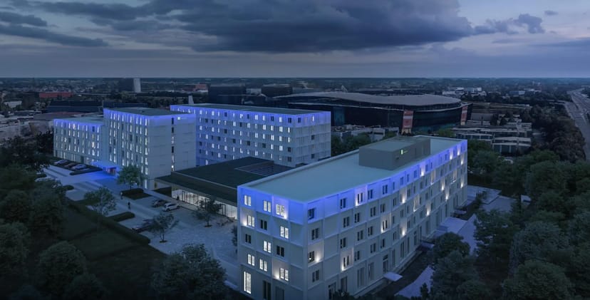 Modern Scala event center at night, featuring sleek architecture for corporate and social events.