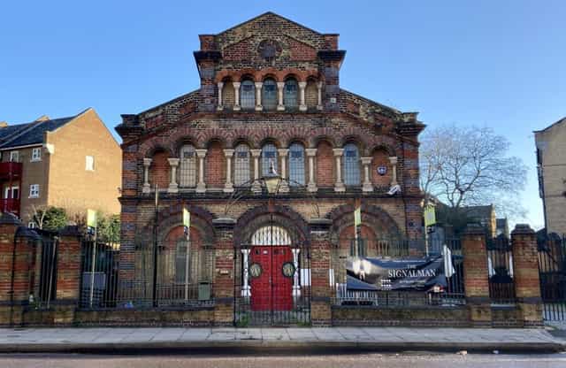 Historic venue with intricate brickwork, perfect for conferences and social events.