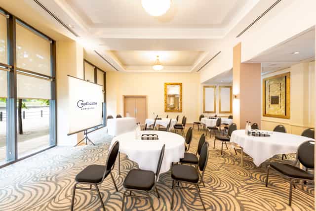 Meeting space with round tables at Copthorne Hotel Newcastle for corporate events.