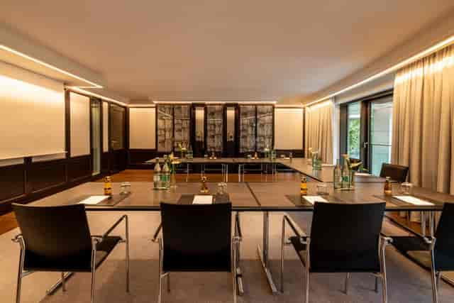 Modern meeting room at Sofitel Frankfurt Opera for corporate events and workshops.