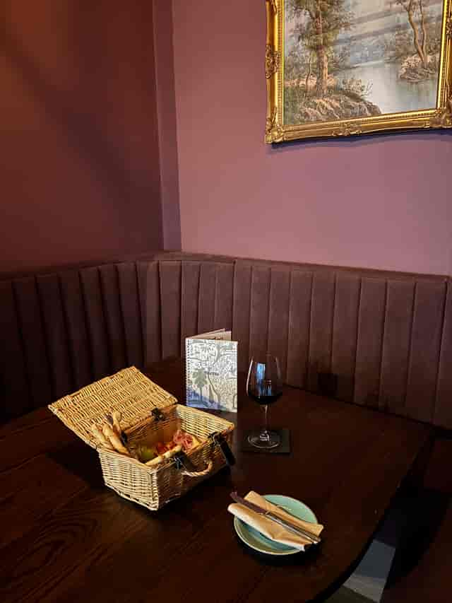 Inviting dining setup in BELLE's Renshaw Street for intimate meetings and small events.