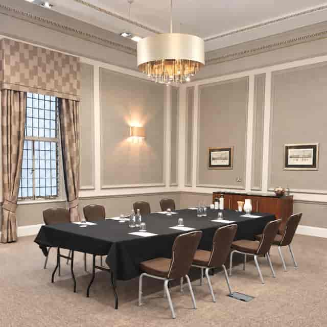 Empire Suite boardroom setup with elegant architecture for professional corporate meetings.