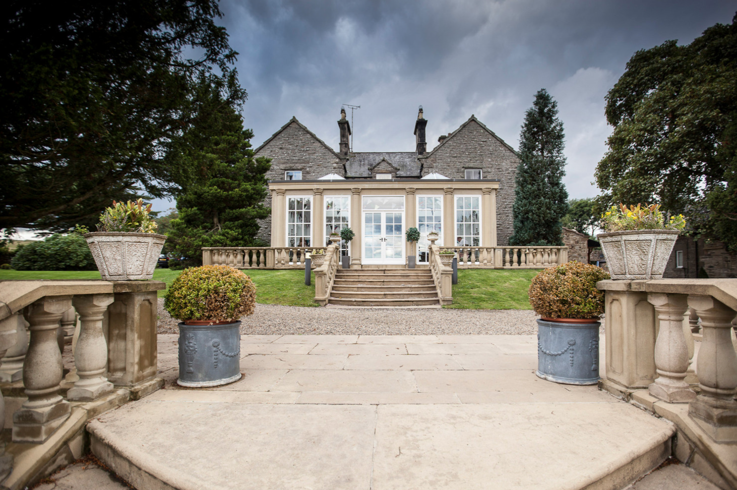 Olive House venue with elegant entrance, ideal for corporate events and receptions. - Banner