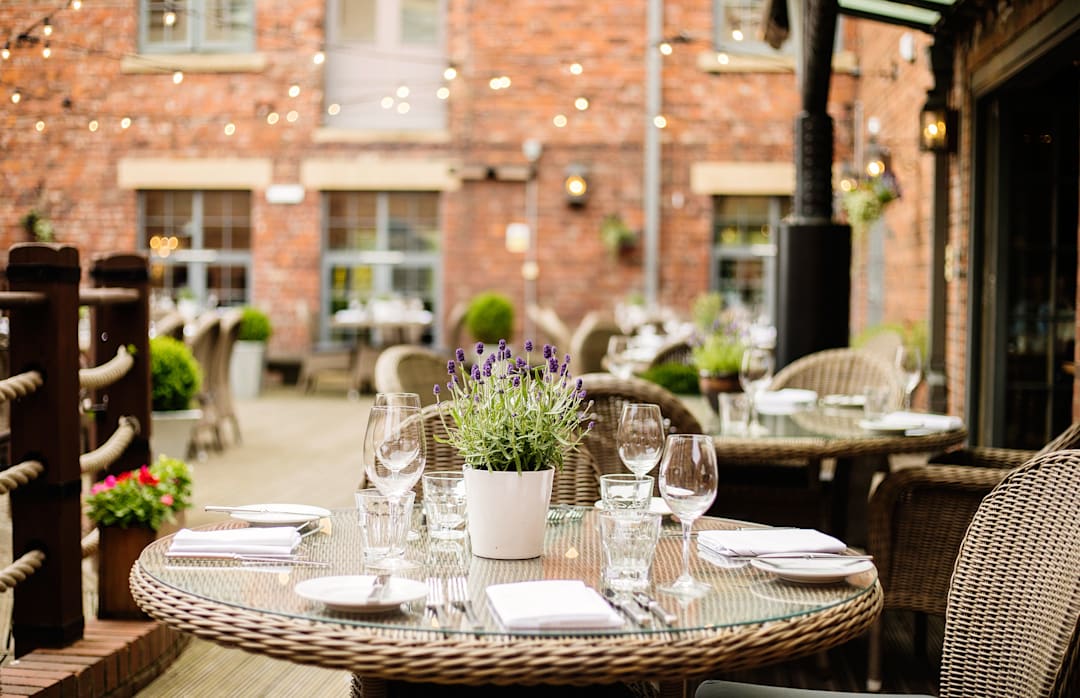 Charming outdoor dining at Bistro in Hotel du Vin Newcastle for elegant events. - Banner