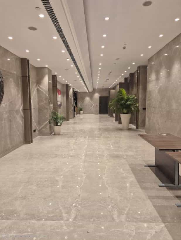 Sapphire Ballroom at Holiday Inn, Delhi: modern space with polished marble for conferences and receptions.