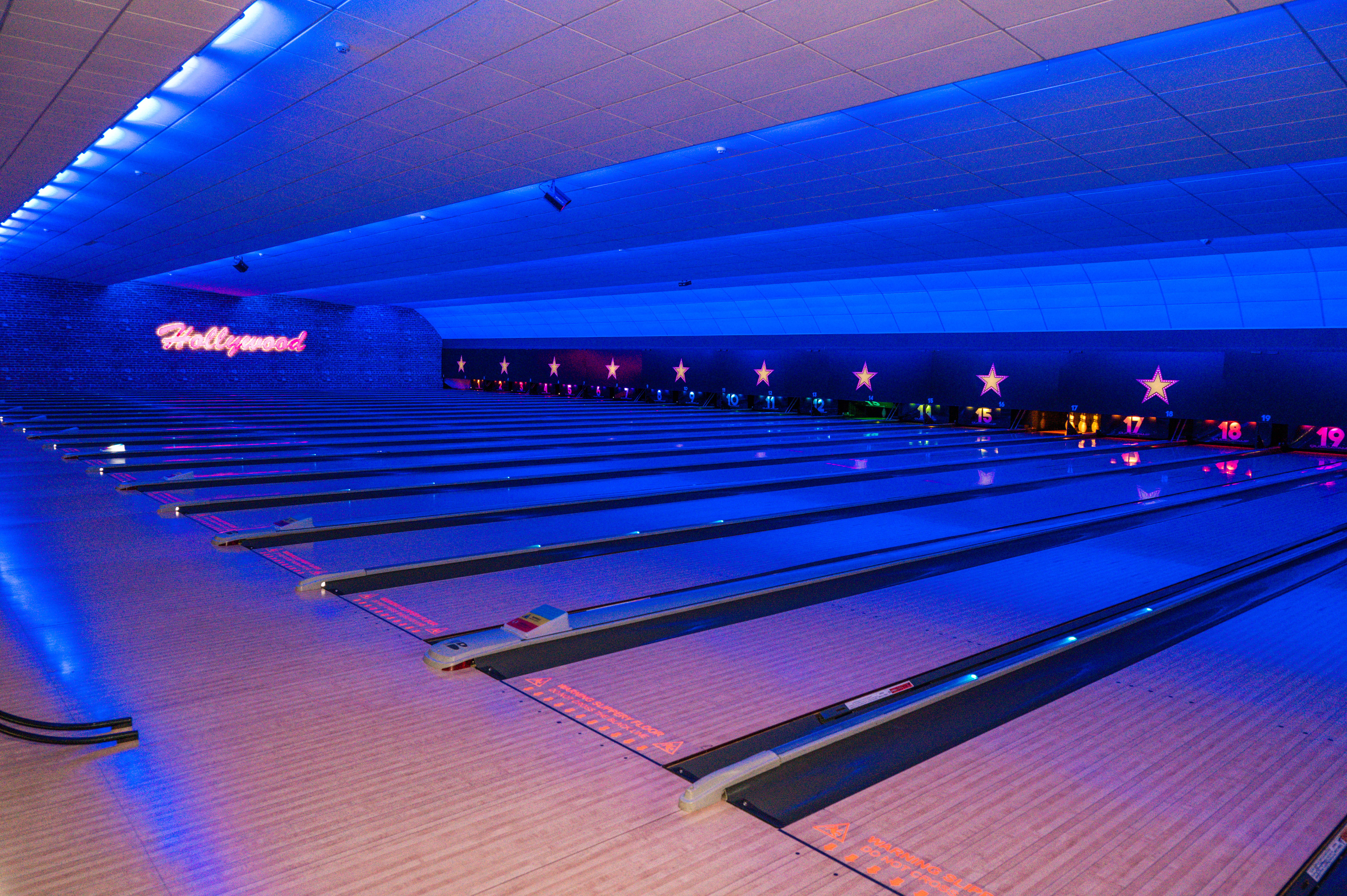 Hollywood Bowl Wolverhampton: Corporate team building venue with atmospheric lighting. - Banner