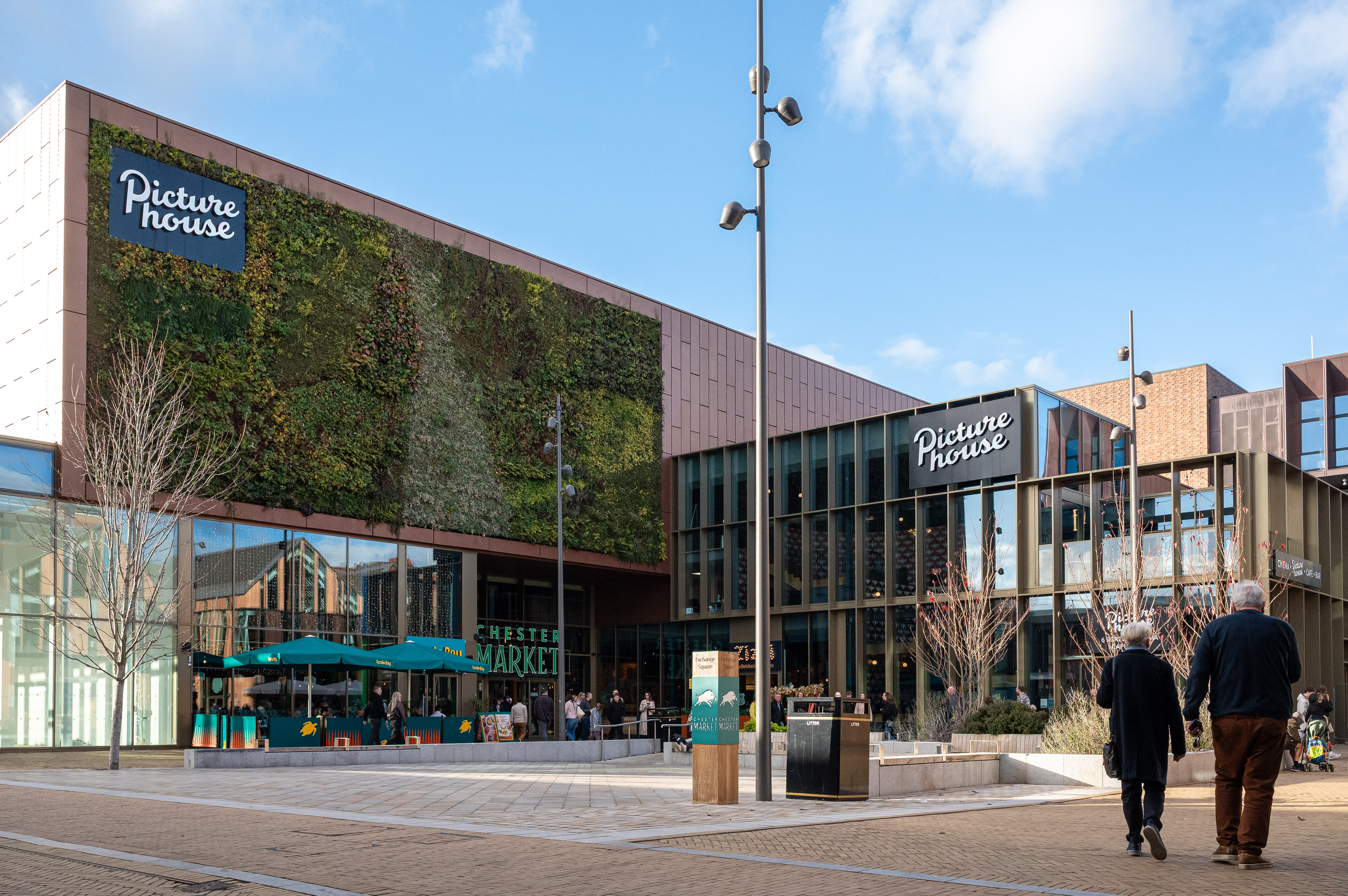 Modern Exchange Square venue for corporate events and networking mixers with indoor-outdoor flow.