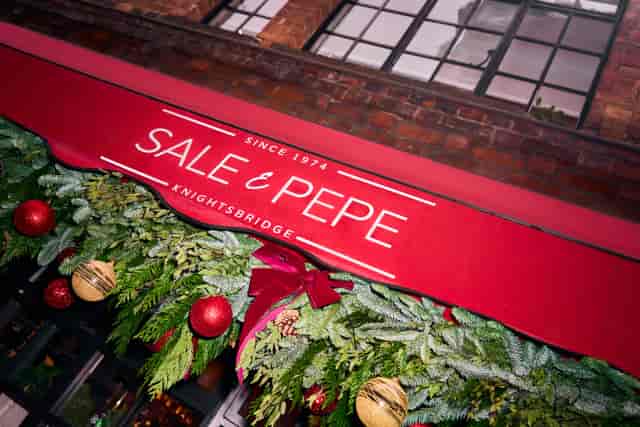 Festive entrance at Sale e Pepe Knightsbridge for corporate dinners and holiday networking events.