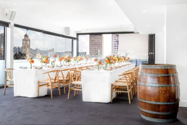 The Surry Rooftop banquet setup with city skyline view for luxury corporate events and weddings.