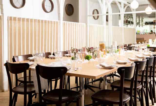 Osteria Coogee private event venue with minimalist curtains for corporate luncheons and dinners.