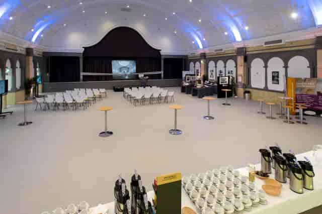 Great Hall London Metropolitan University conference venue with theater seating for networking events.