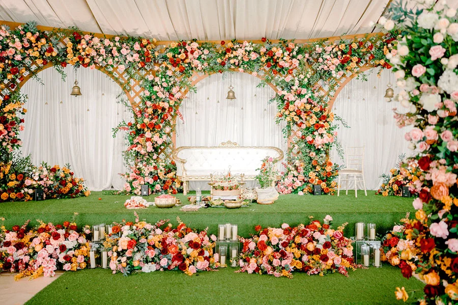 Elegant grand marquee venue in Loughton, featuring lush floral arrangements for weddings.