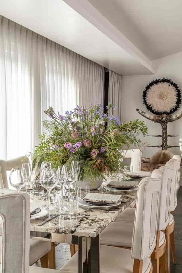 The Penthouse at The Mandrake: VIP boardroom dinner setup with bespoke floral centerpiece.