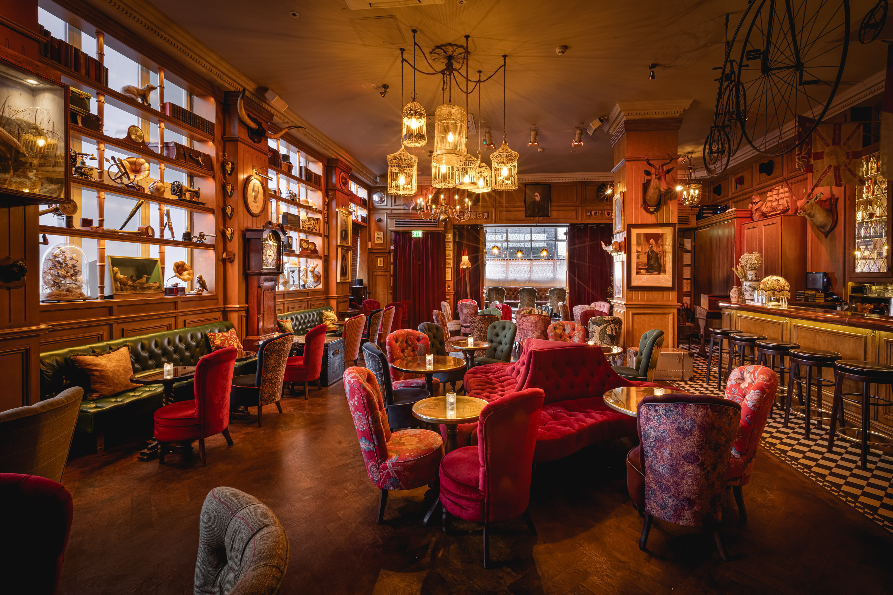 Semi-private event space for 21-29 guests, stylish decor, ideal for networking or gatherings.