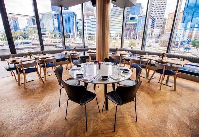 The Boardwalk venue, Reveley: elegant corporate luncheon space with city views.