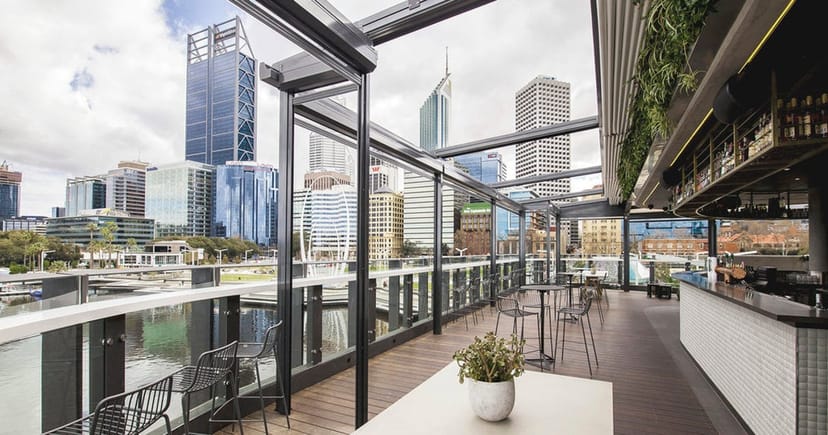 Henry's Rooftop Bar with skyline views for corporate cocktail networking events.