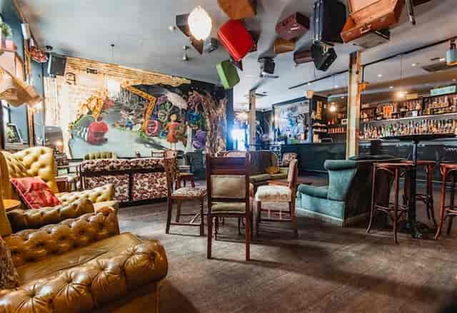 Venue Exclusive in Wolf Lane: Eclectic event space with whimsical ceiling for networking events.