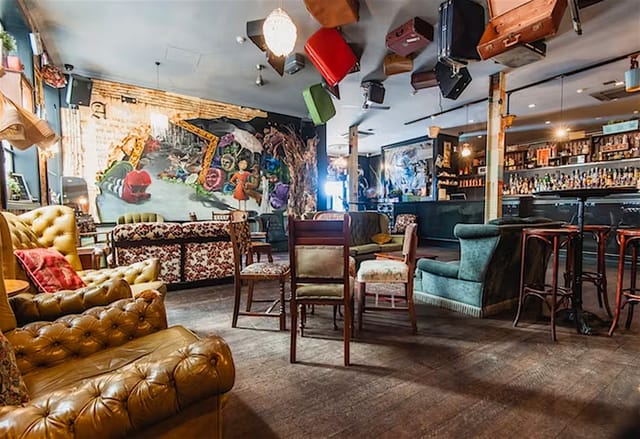 Venue Exclusive in Wolf Lane: Eclectic event space with whimsical ceiling for networking events.
