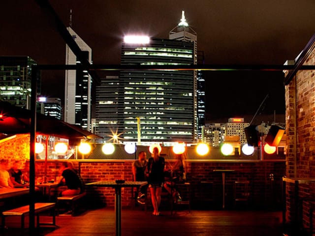 Rooftop terrace at Connections Nightclub with skyline view for corporate events and networking.