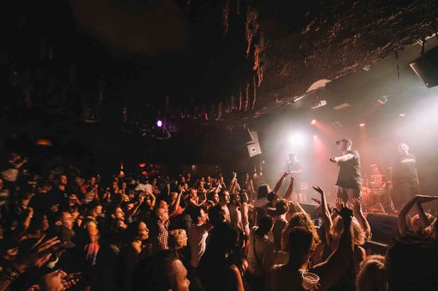 Hen House Live Room: immersive stage production at Badlands Bar for live music events.