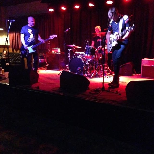 Hen House Live Room at Badlands Bar with stage band for corporate event and conference social.