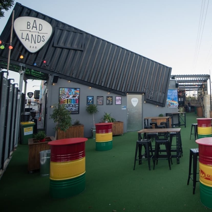 Industrial-chic Ivy Gardens outdoor venue for networking mixers and themed evening receptions.