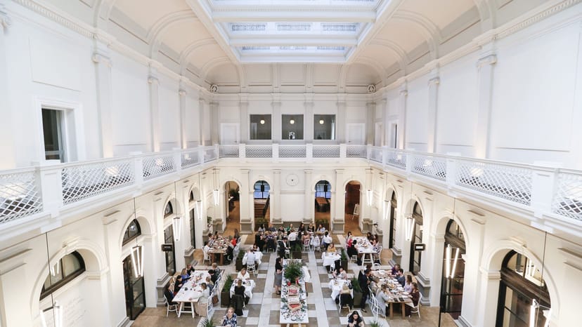 Postal Hall venue with high ceilings, perfect for elegant dining and sophisticated event receptions.