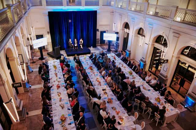 Corporate gala banquet at Postal Hall: historic atrium venue for formal business events.