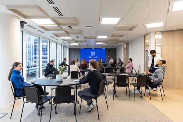 Flexible workspace at The Pavilion at Ellisse with modular tables for corporate event meetings.