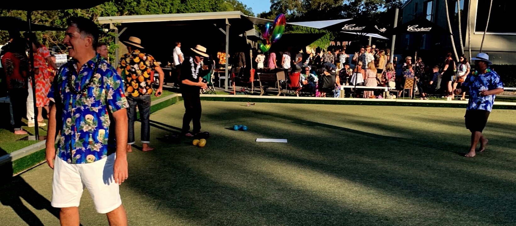 BBQ area at Avalon Bowlo with vibrant crowd, perfect for summer gatherings and team-building.