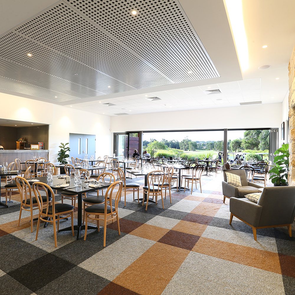 Spacious Collaroy SLSC function room with elegant decor, perfect for meetings and gatherings.