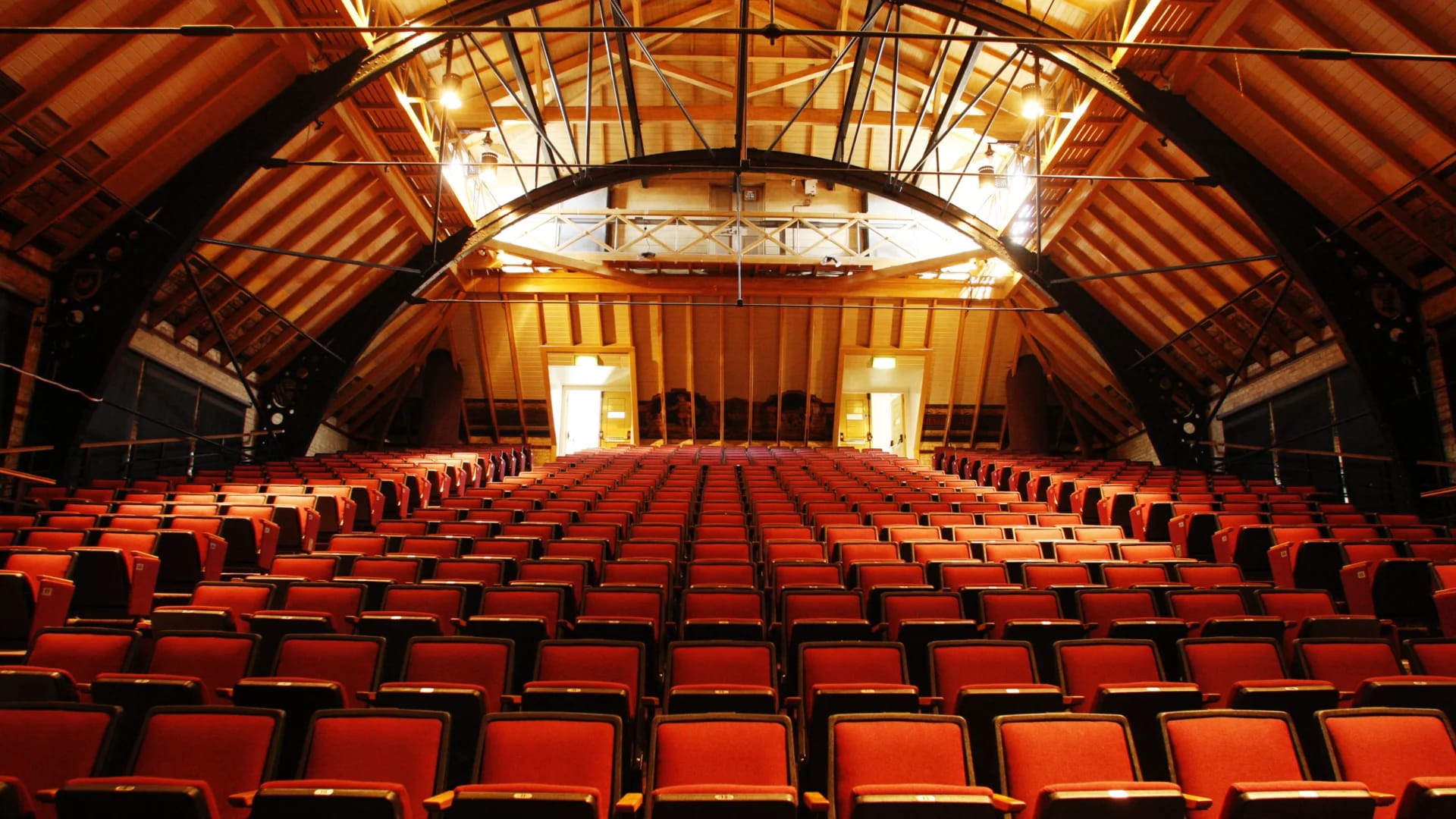Cambridge Corn Exchange auditorium with rustic architecture for keynote and plenary events.