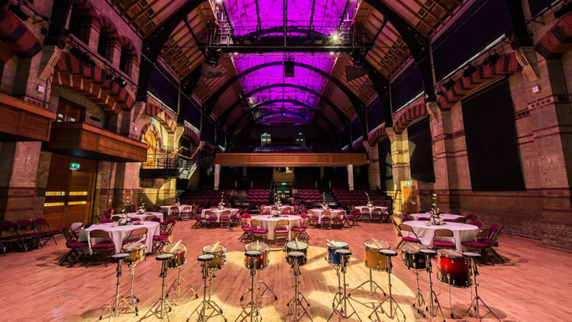 Schering Room at Cambridge Corn Exchange: intimate cabaret-style venue for corporate events.
