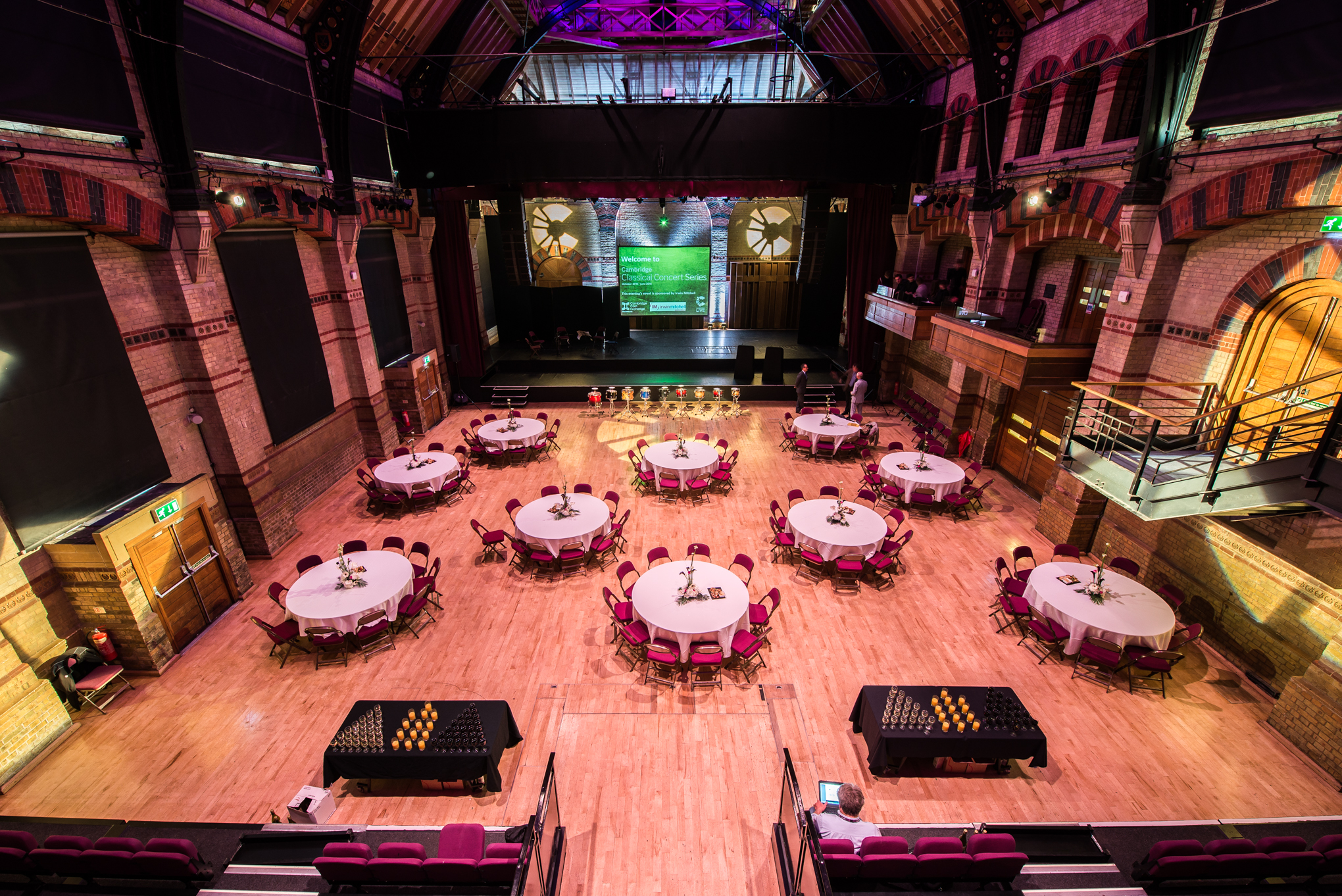 Gala dinner setup in Schering Room, Cambridge Corn Exchange: spacious heritage event venue.