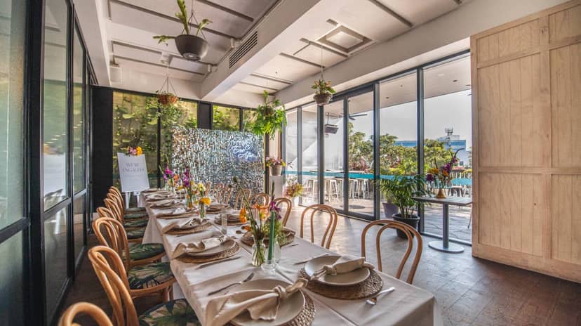 Private dining room with natural light, perfect for upscale board dinners and boutique events.