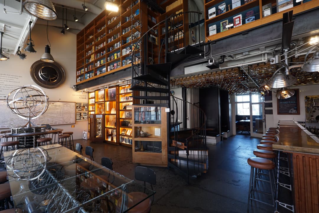 Industrial-chic One Eighty Main Space for VIP networking and creative workshops.
