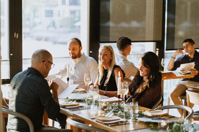 Corporate networking dinner at Low Kee Dining Room featuring sophisticated decor.