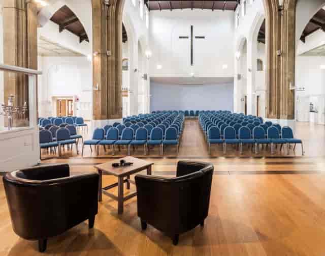 Heritage meeting room in St Paul's Cambridge for panel discussion and fireside chat events.