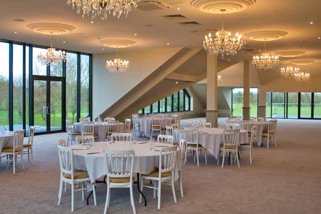 Royal Suite at Cambridge Country Club with chandeliers for weddings and corporate events.